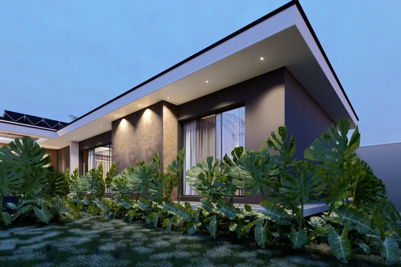 Fachada posterior iluminada à noite com iluminação de destaque nos volumes