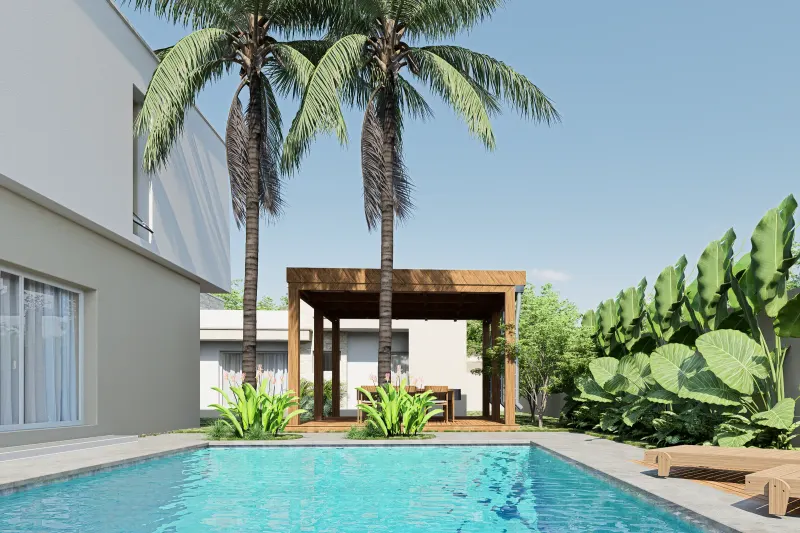 Piscina exterior ladeada por palmeiras e pérgula de madeira para refeições