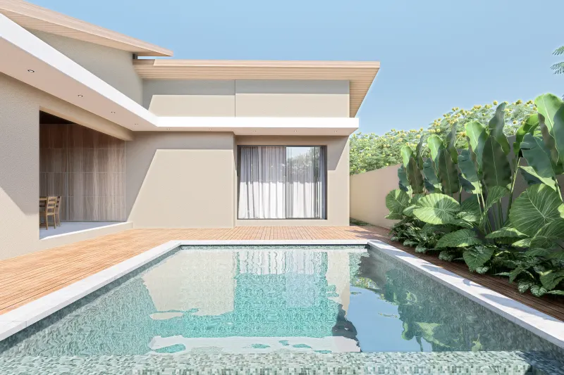 Zona de piscina exterior com deck em madeira e vegetação ornamental densa