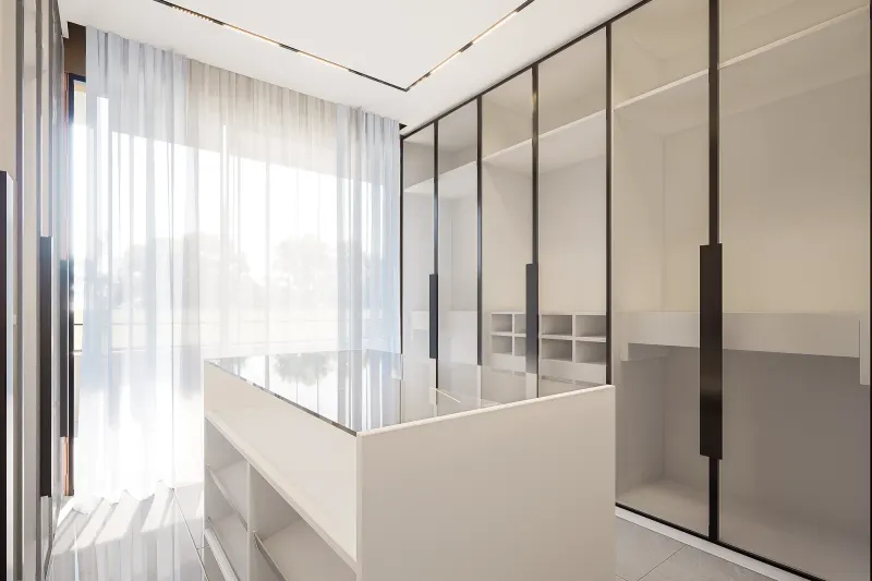 Closet moderno planeado com ilha central e armários com portas de vidro fumado