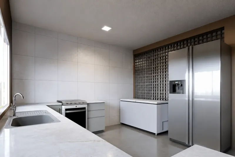 Cozinha de serviço com bancada em mármore, eletrodomésticos e parede vazada